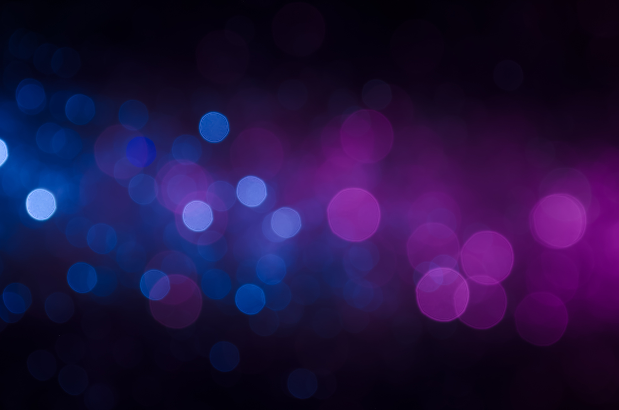 Blue and purple bokeh background.